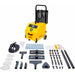 Yellow and black steam cleaner kit with a wheeled cart, shown with multiple attachments, hoses, nozzles, a blue cloth, and paperwork on a white background.